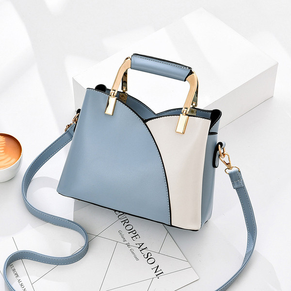 Geanta de dama bicolor din piele ecologica cu manere metalice