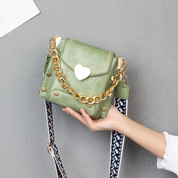 Uue mudeli ökonahast tekstiilist sanga ja metallelementidega naistekott