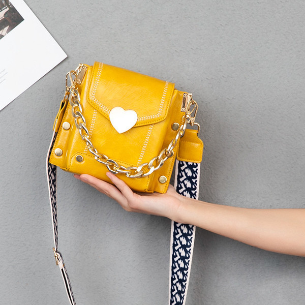 Uue mudeli ökonahast tekstiilist sanga ja metallelementidega naistekott