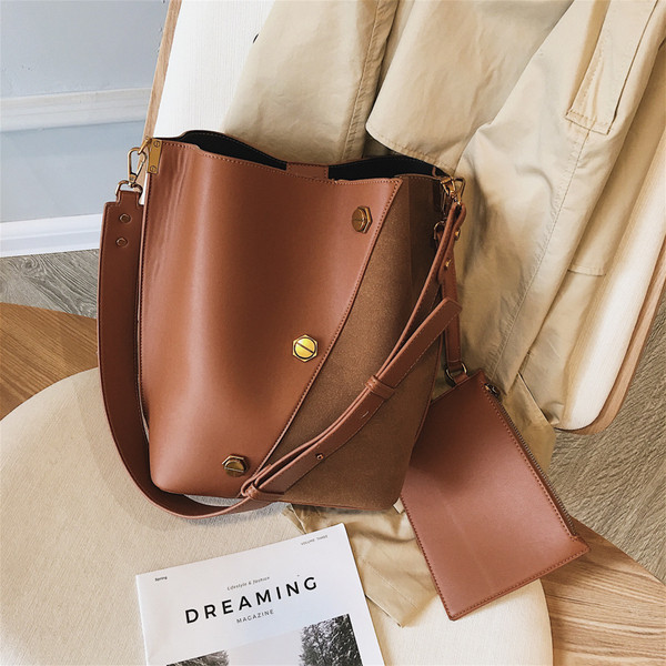 Sieviešu topsomas plats modelis ar garu rokturi