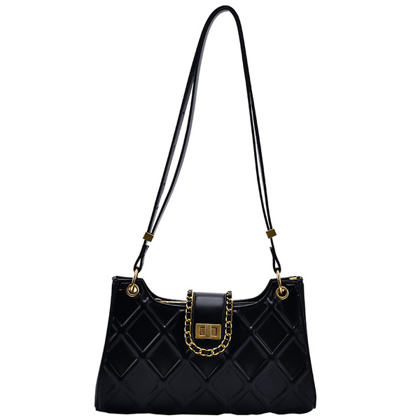 Korszerű női válltáska fém elemekkel