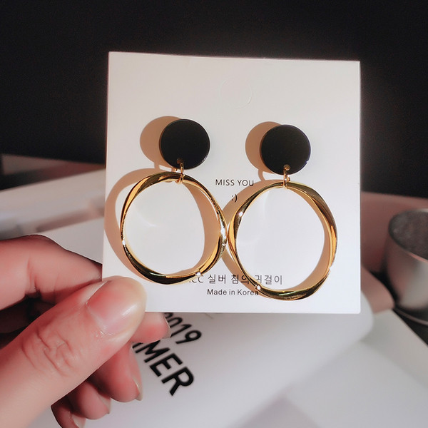 Apaļi sieviešu zelta auskari