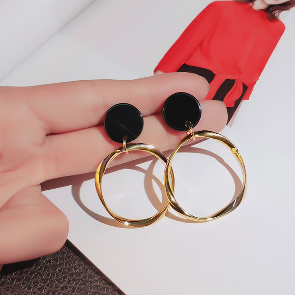 Apaļi sieviešu zelta auskari