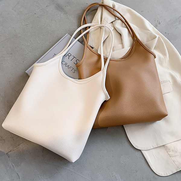 Hétköznapi női válltáska vékony füllel