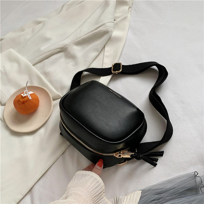 Sieviešu ādas soma ar regulējamu rokturi