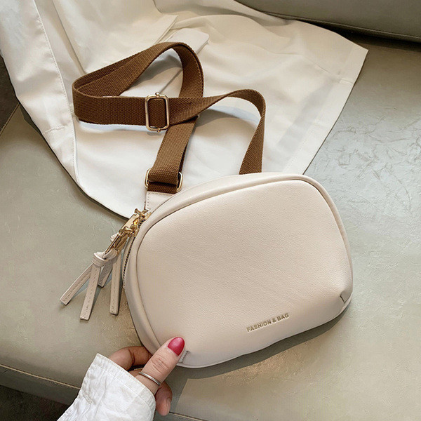 Sieviešu ādas soma ar regulējamu rokturi