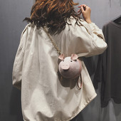 Sieviešu moderna soma apaļā formā ar 3D elementiem