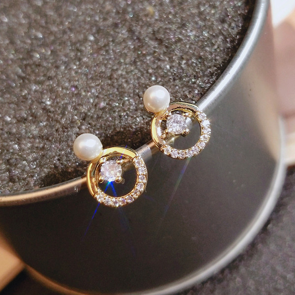 Apaļi sieviešu auskari ar akmeņiem un pērlēm