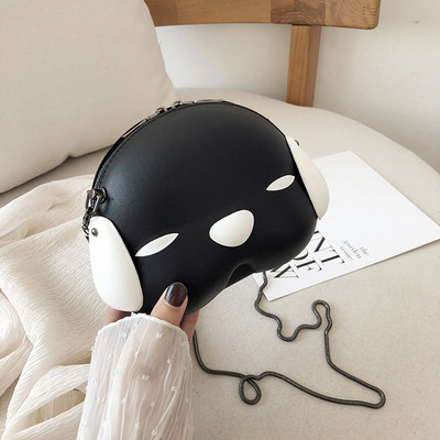 Aktuālā sieviešu soma apaļā formā ar metāla rokturi