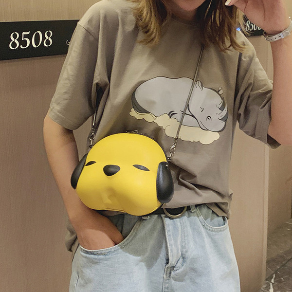 Aktuālā sieviešu soma apaļā formā ar metāla rokturi