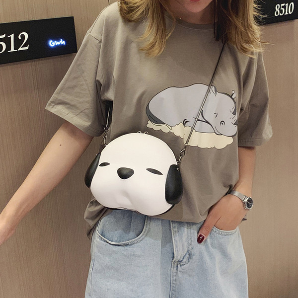 Aktuālā sieviešu soma apaļā formā ar metāla rokturi