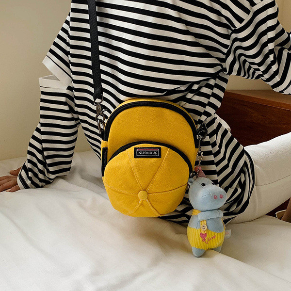 Sieviešu mūsdienīga tekstila soma nestandarta formā