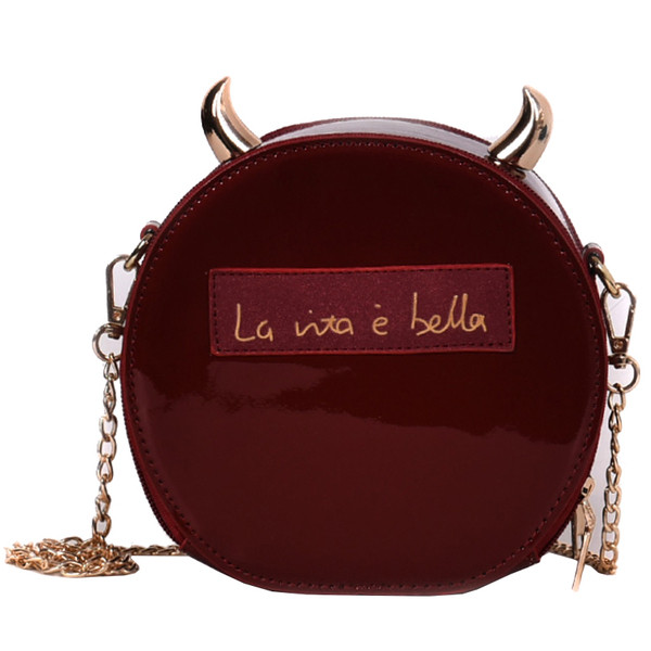 Γυναικεία έκο δερμάτινη τσάντα  σε στρογγυλό σχήμα με επιγραφή