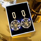 Ženske zlatne naušnice okruglog oblika sa biserima