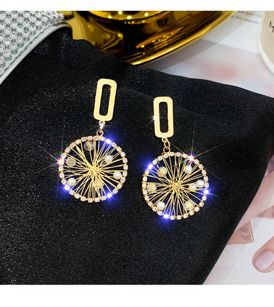 Ženske zlatne naušnice okruglog oblika sa biserima