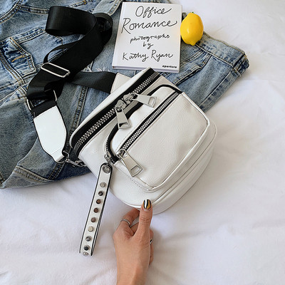 Γυναικεία μοντέρνα τσάντα οικολογικού δέρματος με φερμουάρ και μακριά λαβή