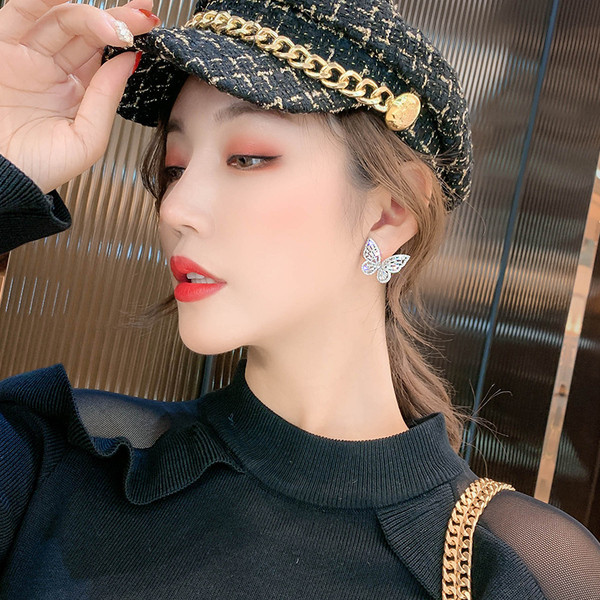 Sieviešu sudraba auskari tauriņa formā