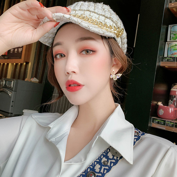 Sieviešu sudraba auskari tauriņa formā