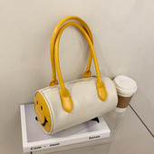 Aktuālā sieviešu soma apaļā formā ar garu rokturi