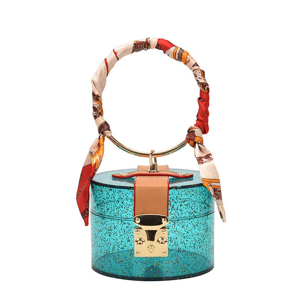 Stílusos női kis táska kerek formában, csattal