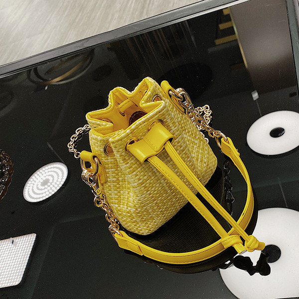 Μοντέρνα γυναικεία μίνι τσάντα από οικολογικό δέρμα με κορδόνια