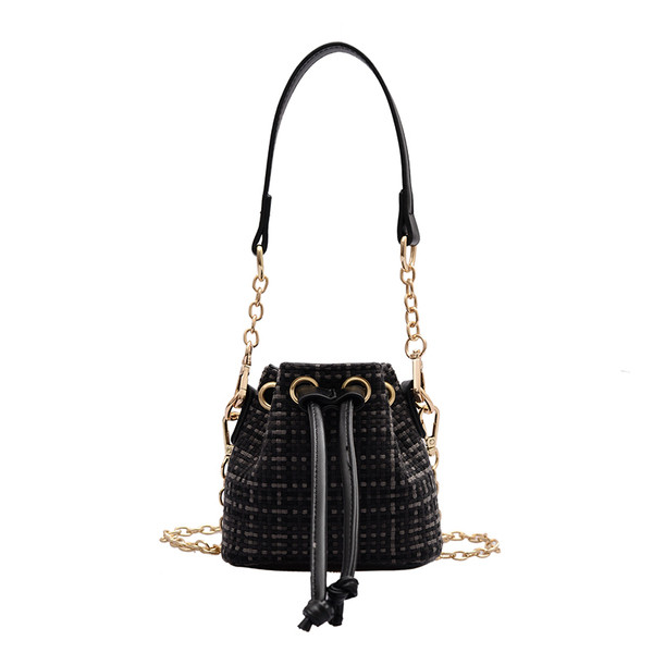 Μοντέρνα γυναικεία μίνι τσάντα από οικολογικό δέρμα με κορδόνια