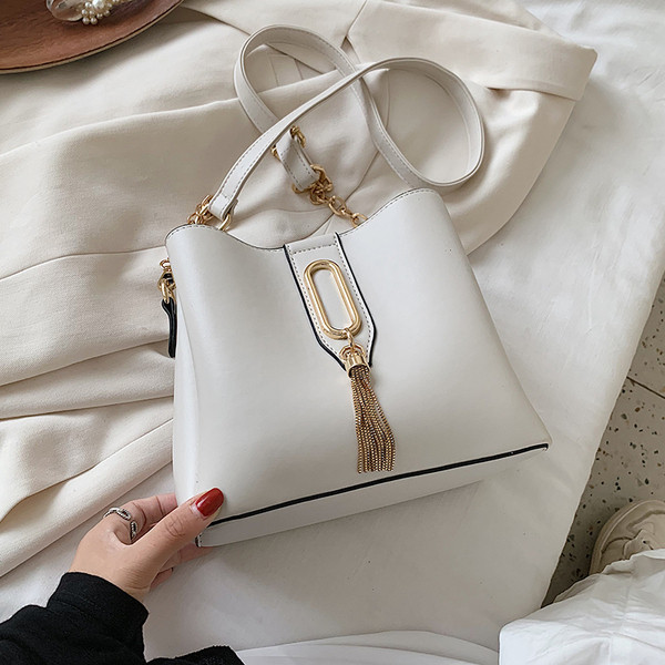 Öko-nahast pandla ja ripatsiga naiste igapäevakott