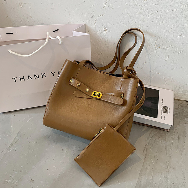 Stilīgs sieviešu somas vienkāršs modelis ar gariem rokturiem