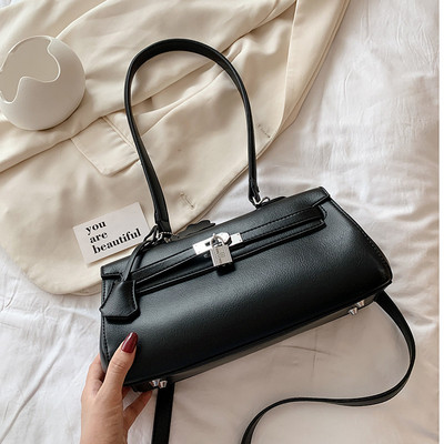 Stiilne pandlaga naiste kott