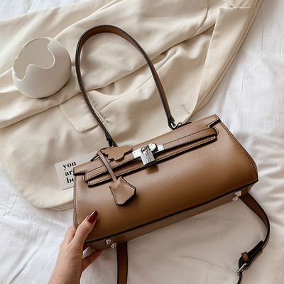 Stiilne pandlaga naiste kott