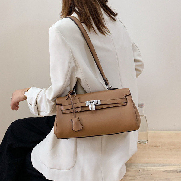 Stiilne pandlaga naiste kott