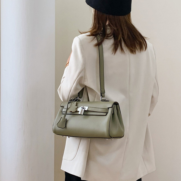 Stiilne pandlaga naiste kott