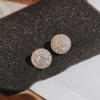 Στρογγυλά γυναικεία σκουλαρίκια καλυμμένα με πέτρες