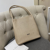 Γυναικεία  τσάντα κατασκευασμένη από οικολογικόδέρμα φαρδύ μοντέλο