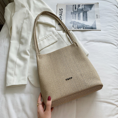 Γυναικεία  τσάντα κατασκευασμένη από οικολογικόδέρμα φαρδύ μοντέλο