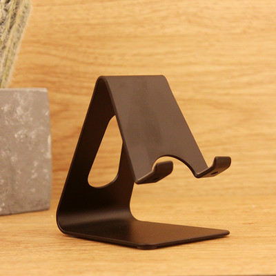 Regulējams metāla statīvs telefonam