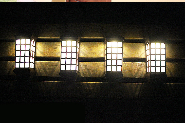 Dekoratyvinis sieninis šviestuvas sodui