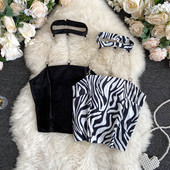 Női sima felső modell vagy kígyómintával és fémláncokkal