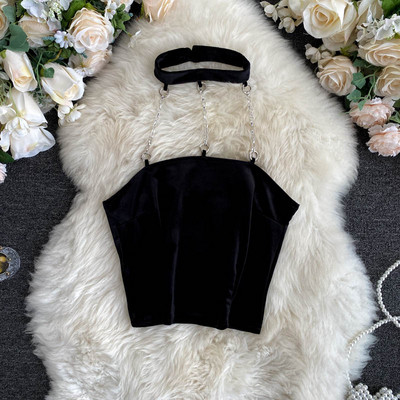 Női sima felső modell vagy kígyómintával és fémláncokkal