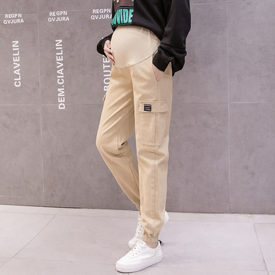 Hosszú női nadrág zsebekkel terhes nők számára