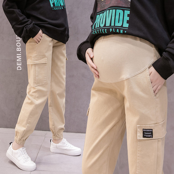 Hosszú női nadrág zsebekkel terhes nők számára