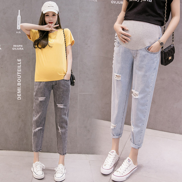 Új modell hosszú női farmer szakadt motívumokkal kismamáknak