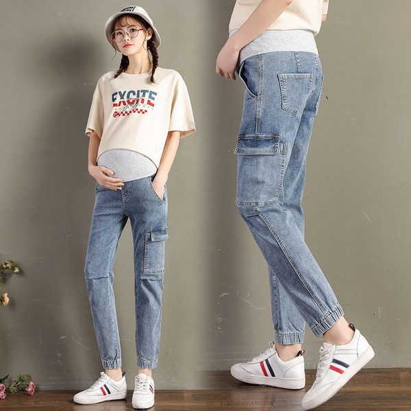 Sieviešu sporta džinsi ar kabatām grūtniecēm