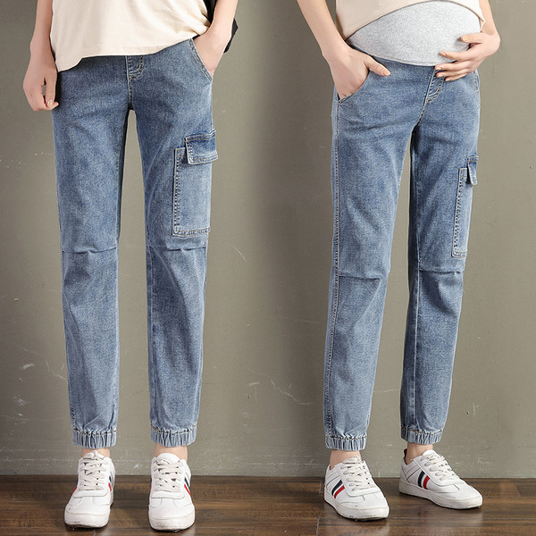 Sieviešu sporta džinsi ar kabatām grūtniecēm