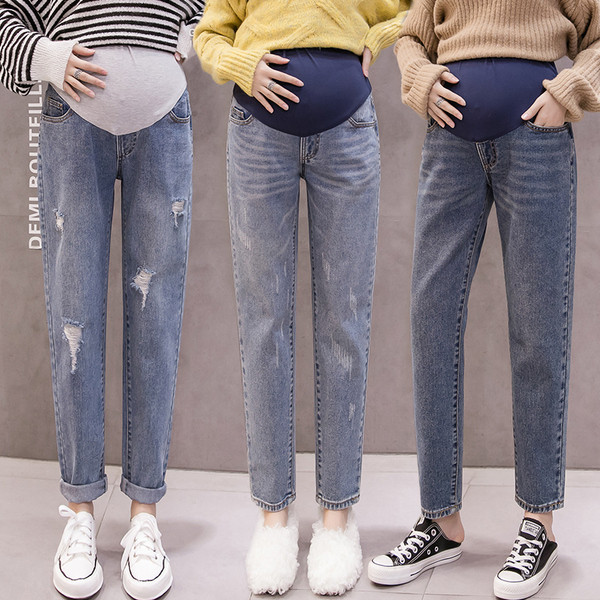 Šiuolaikiniai džinsai nėščioms moterims tiesus modelis