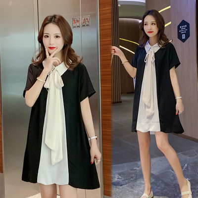 Stílusos női ruha szalaggal és hosszú ujjú fekete színben