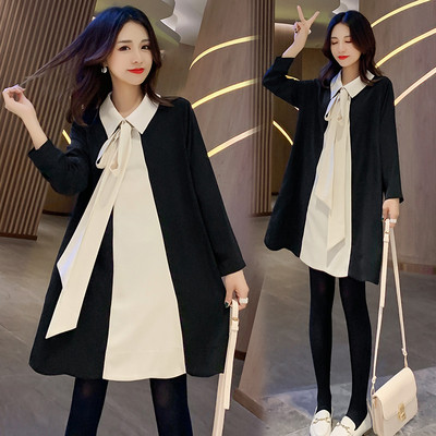 Stílusos női ruha szalaggal és hosszú ujjú fekete színben