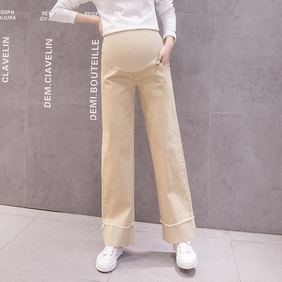 Magas derekú női nadrág új modellje terhes nők számára