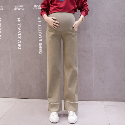 Magas derekú női nadrág új modellje terhes nők számára