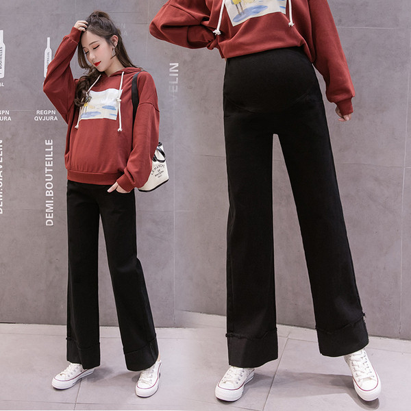 Magas derekú női nadrág új modellje terhes nők számára